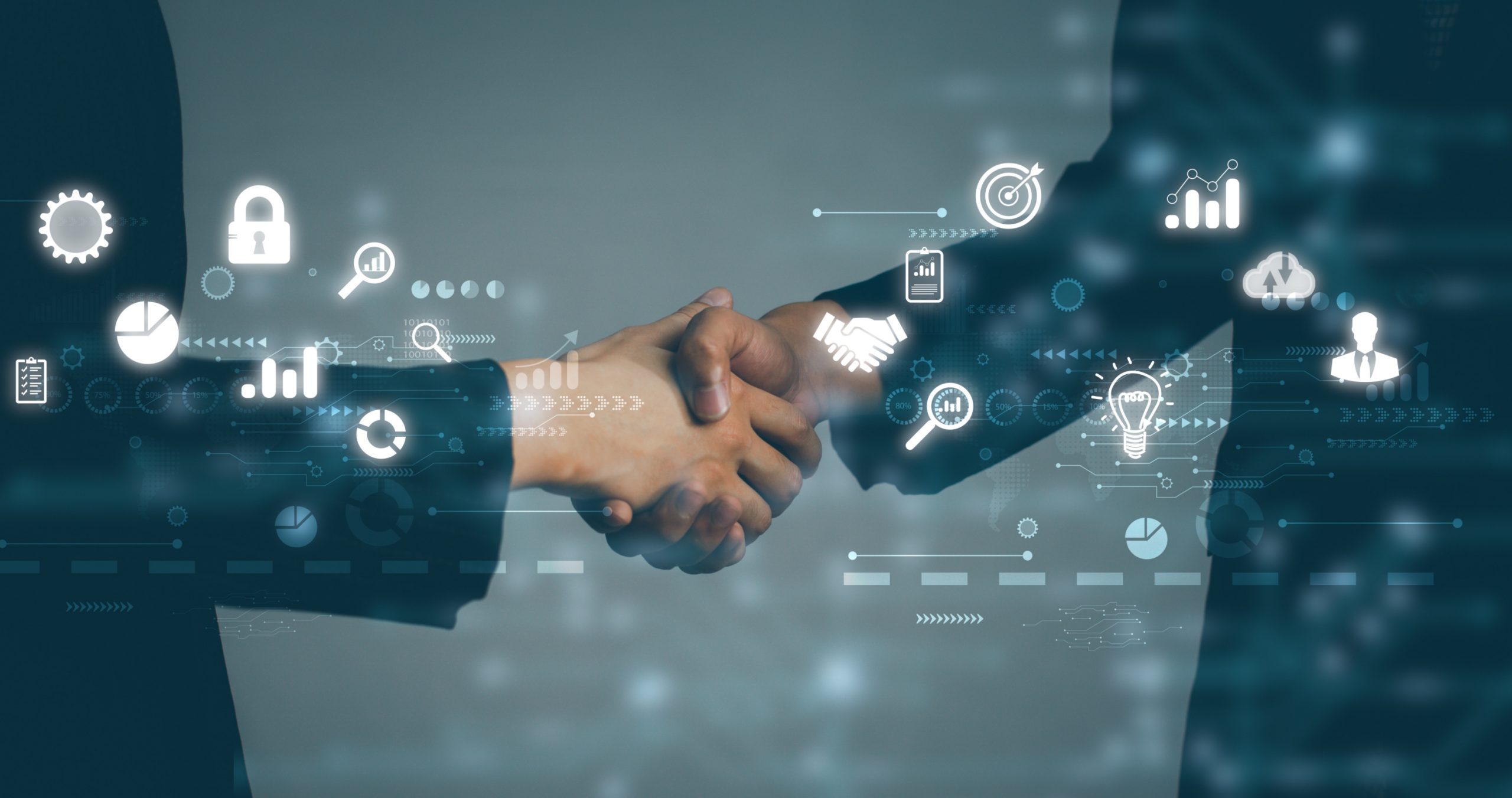 Two men shaking hands exchanging outsourced accounting services.
